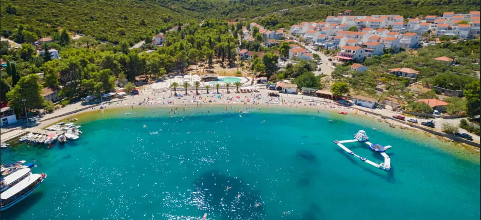 Nečujam Bay on Šolta Island - turquoise waters and pine-covered shoreline, a highlight of the Blue Lagoon tour from Split